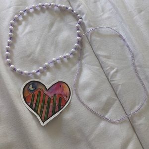 Purple necklaces, each $2